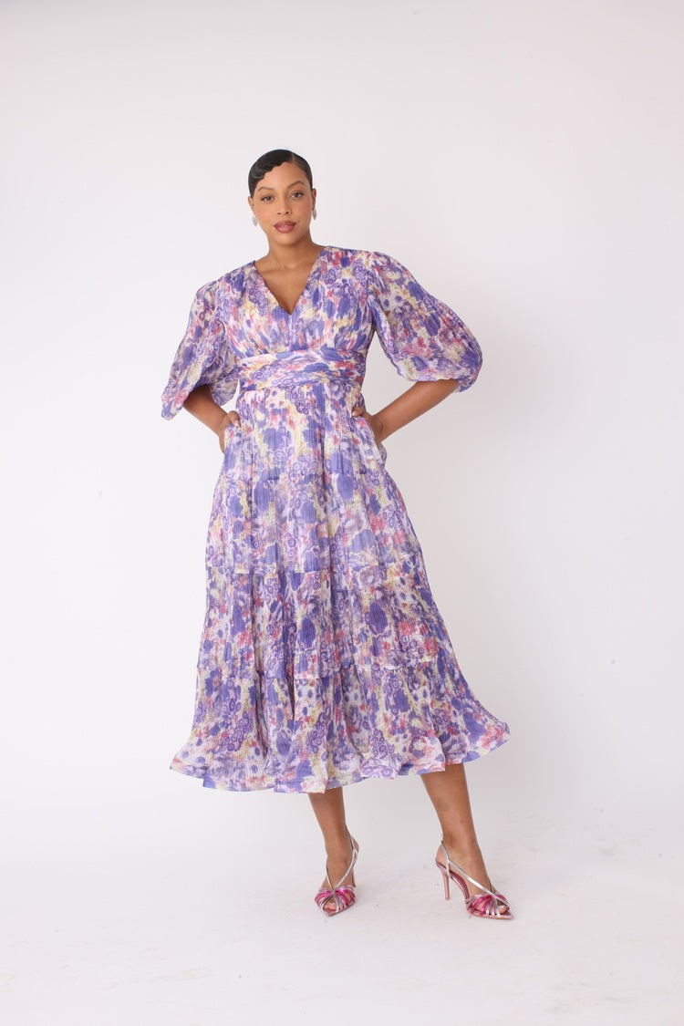 Model wearing purple multi romantic tiered maxi dress with balloon sleeves