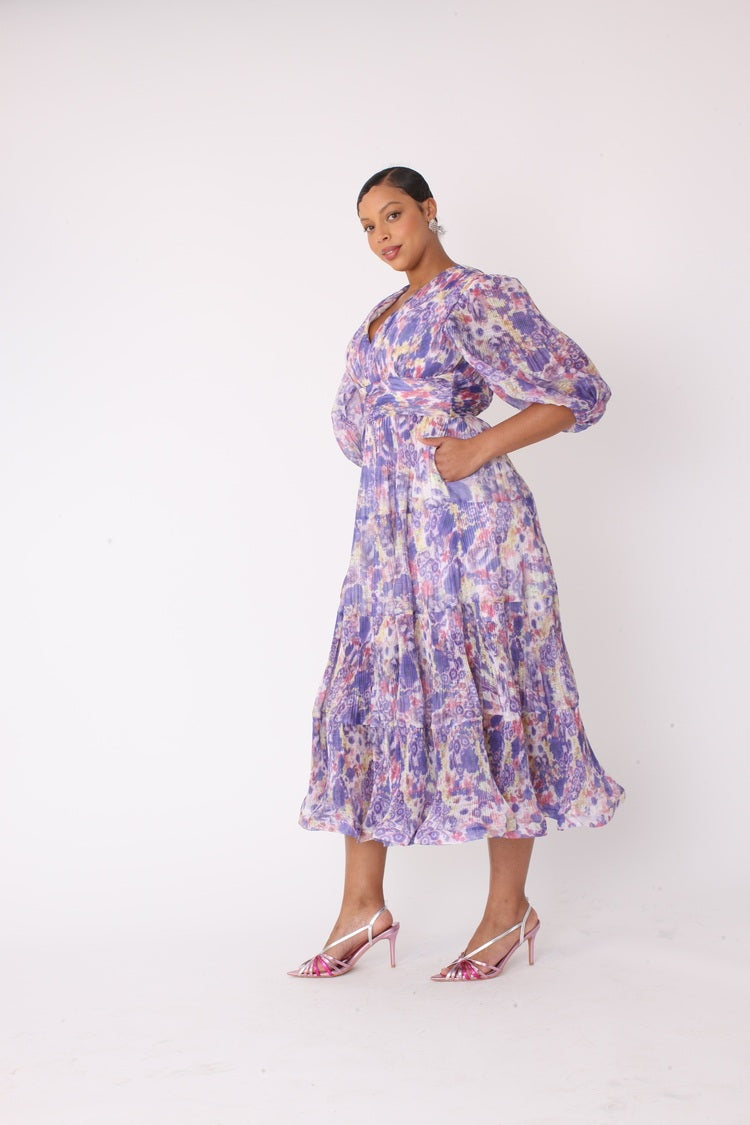 Side view of purple multi balloon sleeve tiered maxi dress