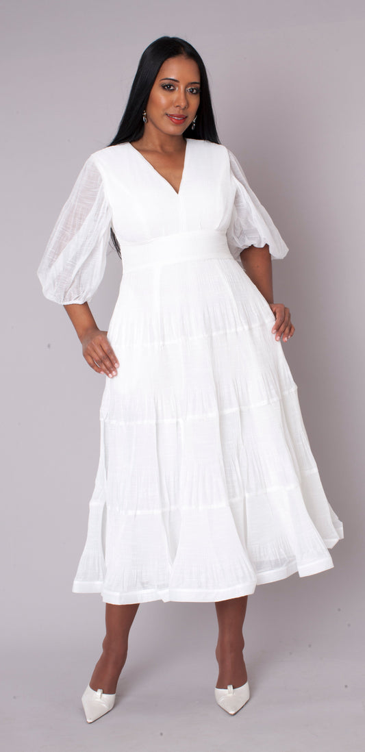 White tiered maxi dress in motion perfect for special occasions
