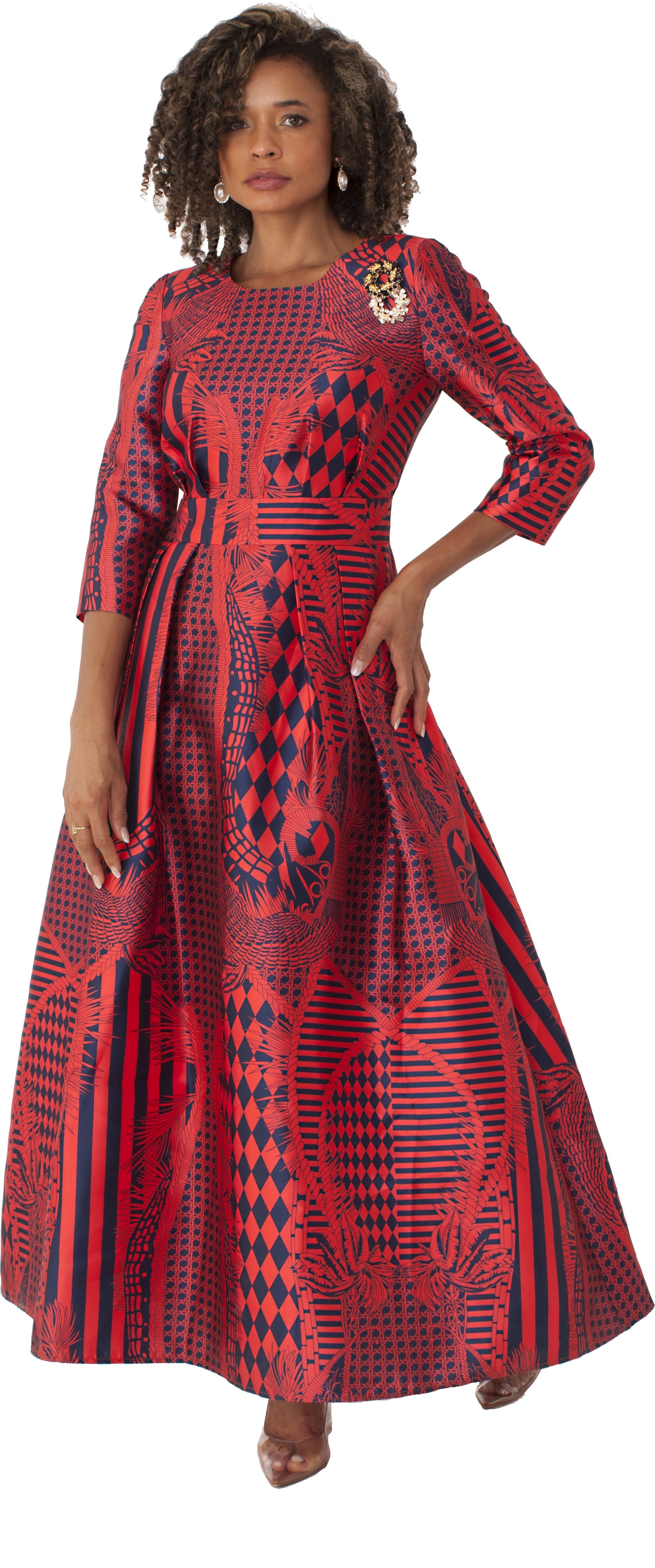 Fire red and navy printed satin dress with rhinestone brooch, model standing front pose – Tally Taylor