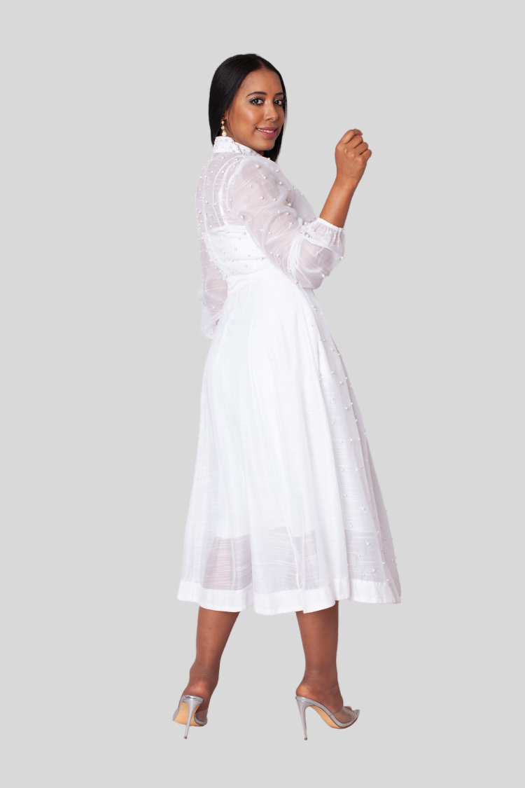 White pearl midi dress angled back view showing waist tie and soft chiffon flow – For Her NYC