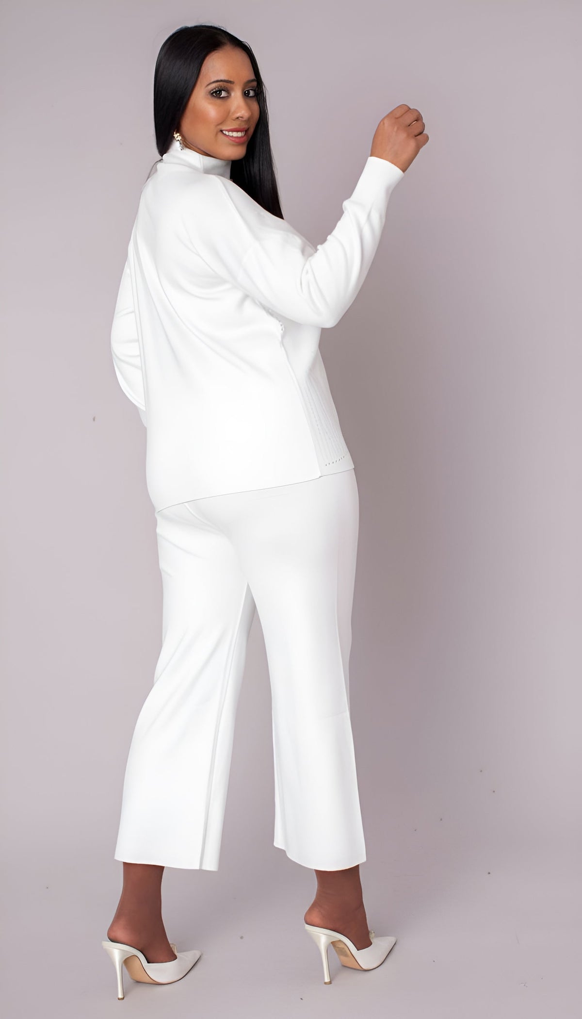 Three-quarter view of white knit pantset with soft crystal accents, wide-leg pants, For Her NYC