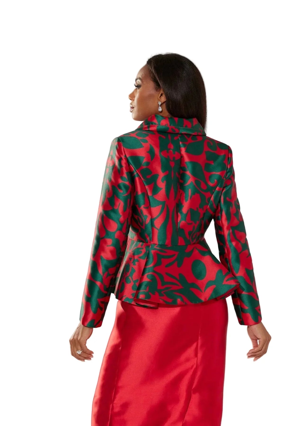 Back view of a model wearing the Tally Taylor Abstract Print Jacket and Midi Skirt Set - U0109, highlighting the padded collar and peplum silhouette