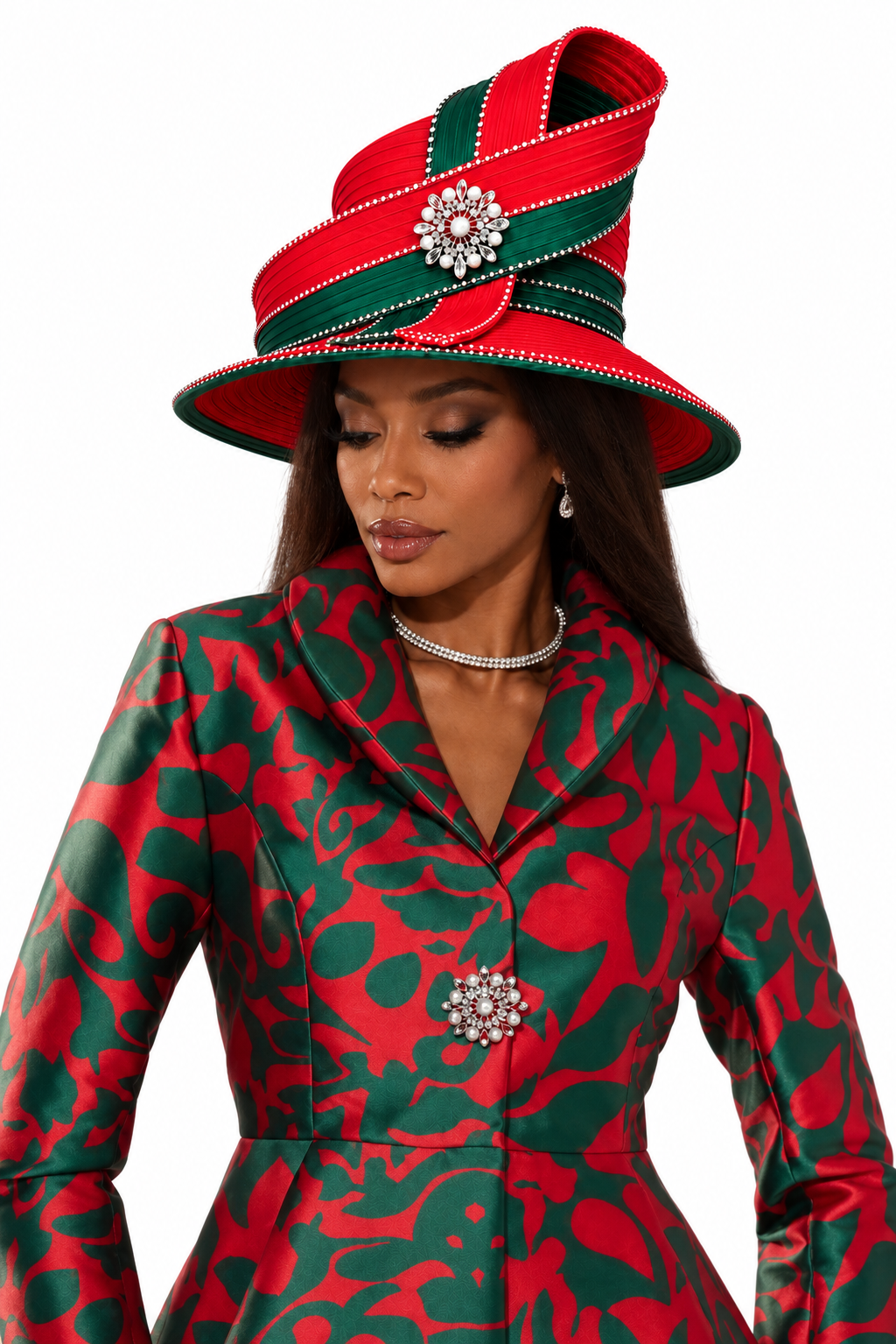 Close-up of a model wearing the Tally Taylor Abstract Print Jacket and Midi Skirt Set - U0109 with a coordinating sculptural hat and jeweled brooch