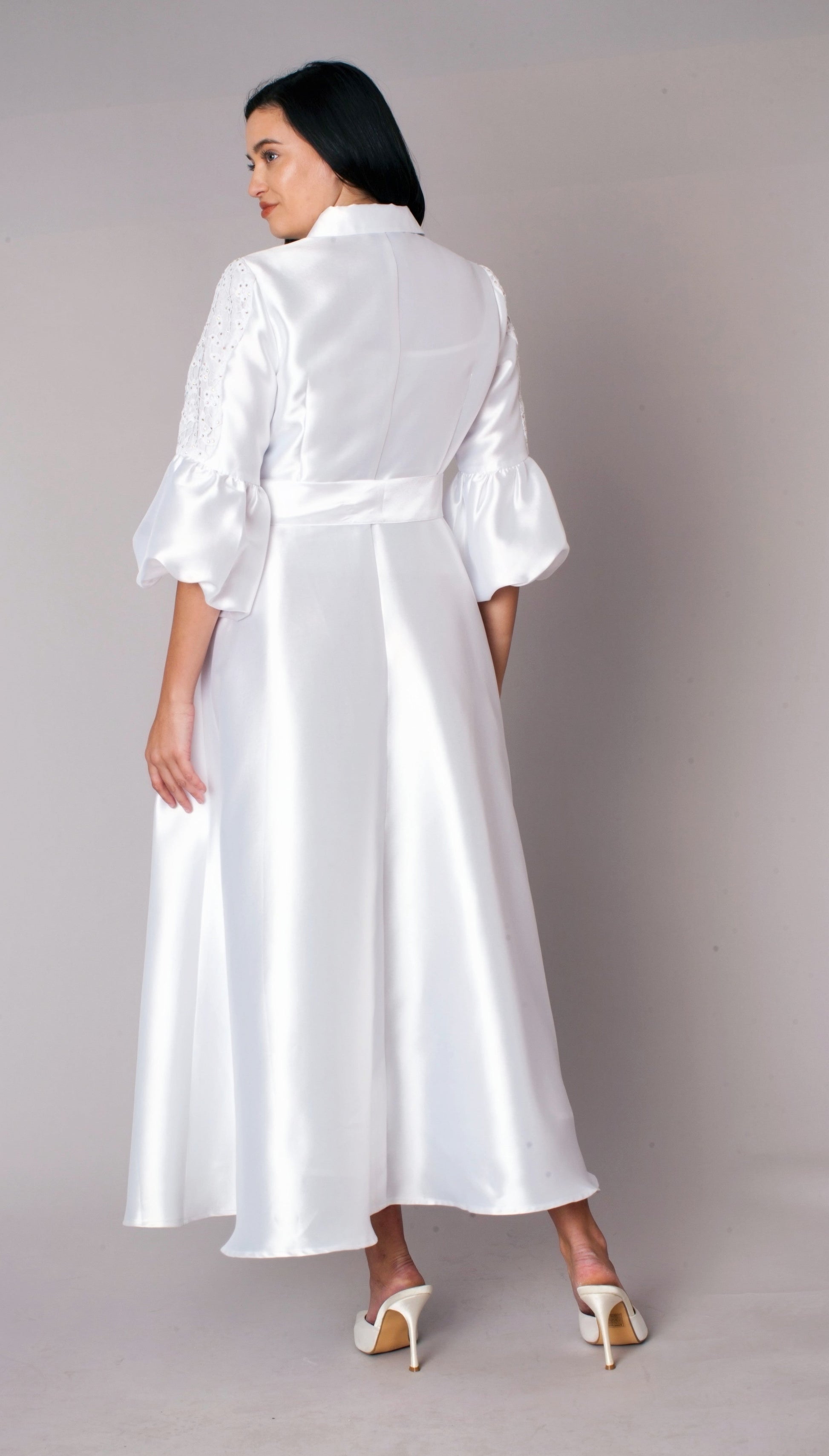 White bishop sleeve tie waist satin-like maxi dress with flowing skirt side view Tally Taylor