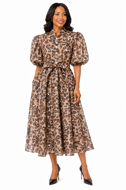 Model wearing the Tally Taylor Animal Print Belted Midi Dress in leopard print, featuring puff sleeves, a button front, and self-tie waist, style S0268.