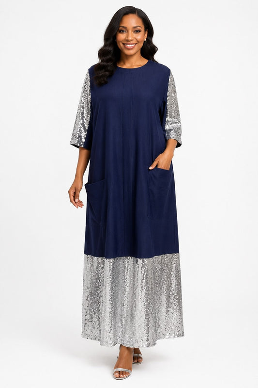 Model wearing the Tally Taylor Sequin Sleeve Maxi Dress in navy and silver, featuring shimmering sequin sleeves and hem with front patch pockets, style S0272.