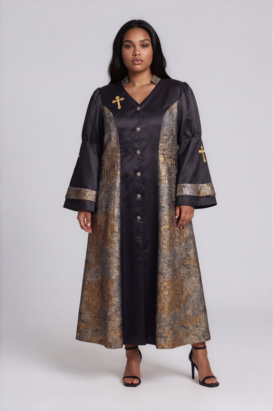 Front view of a plus-size model wearing the black and gold Tally Taylor Plus Size Contrast Panel Bell Sleeve Clergy Robe - 4565W with metallic panels, decorative buttons and cross details