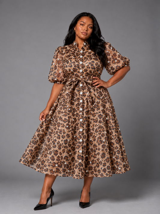 Plus size model wearing the Tally Taylor Animal Print Belted Midi Dress in leopard print, featuring puff sleeves, a button front, and self-tie waist, style S0268W.