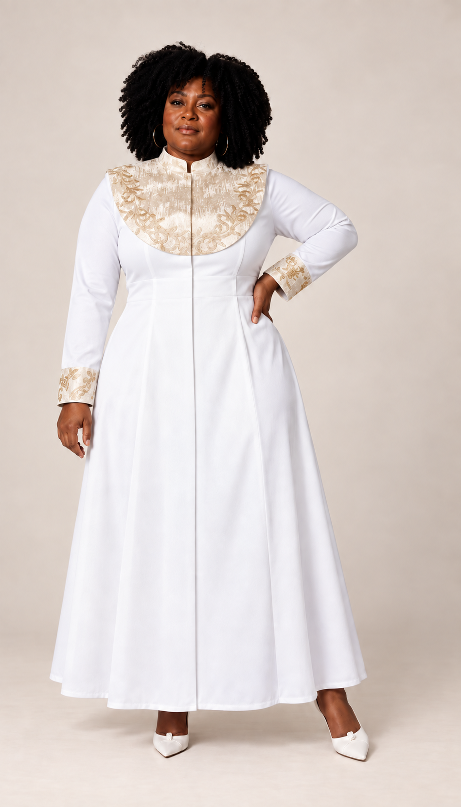 Front view of a plus-size model wearing the white Tally Taylor Plus Size Embroidered Clergy Midi Dress - 41093W with a gold embroidered yoke, high collar, and matching cuffs
