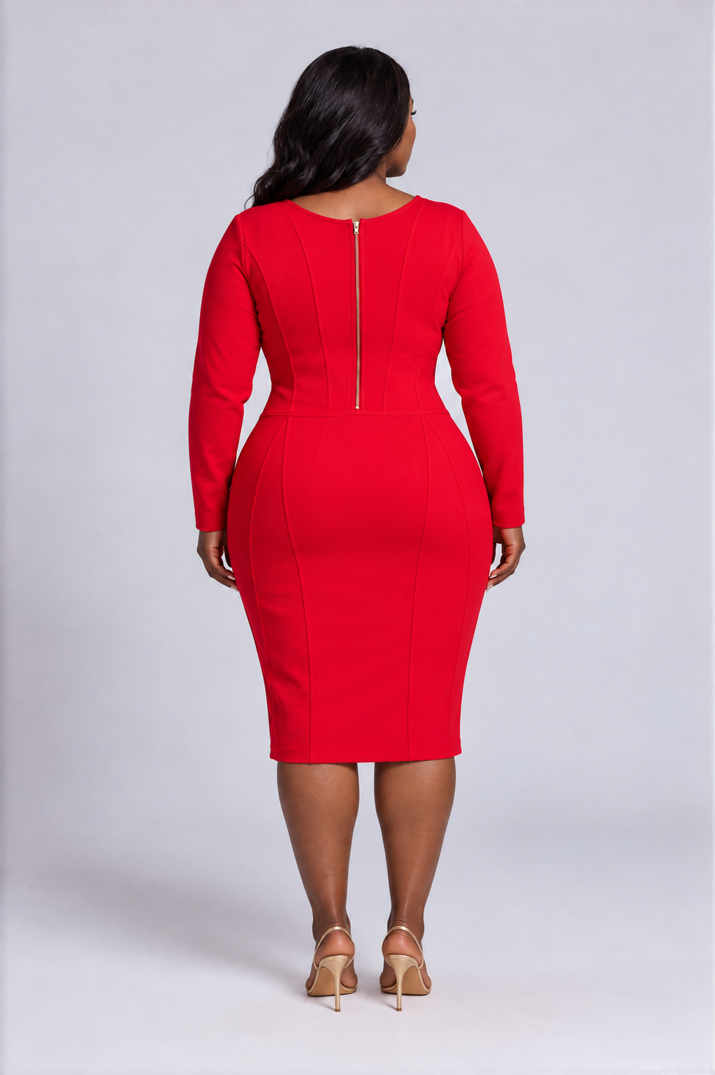 Back view of a plus-size model wearing the red Tally Taylor V-Neck Knit Dress with Gold Button Details - 51001, featuring long sleeves, paneled seams, a back zipper, and a knee-length skirt.