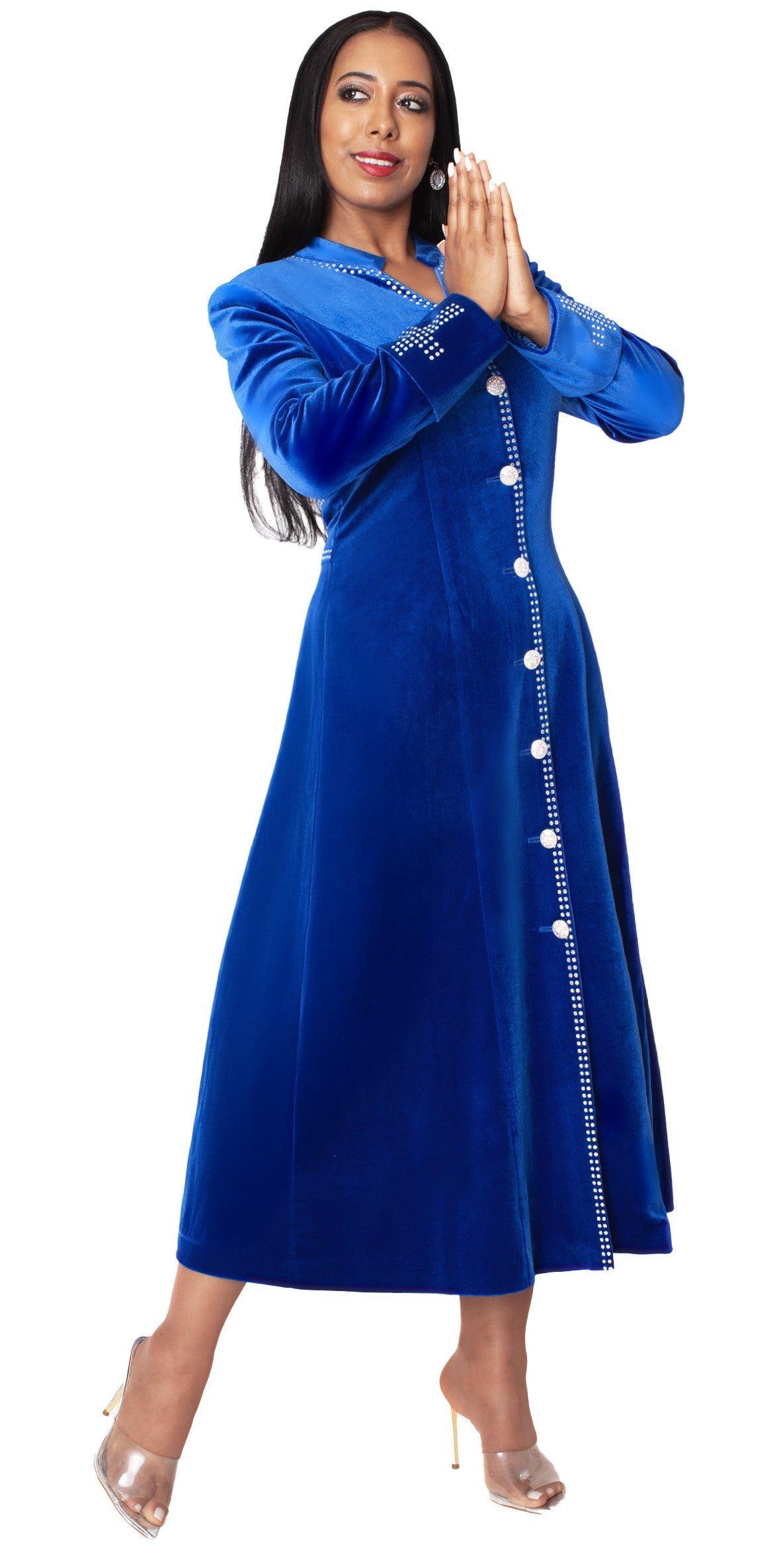 Model wearing royal blue velvet church robe with crystal trim, arms raised pose by Tally Taylor